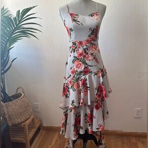 Floral high-low wedding guest dress.